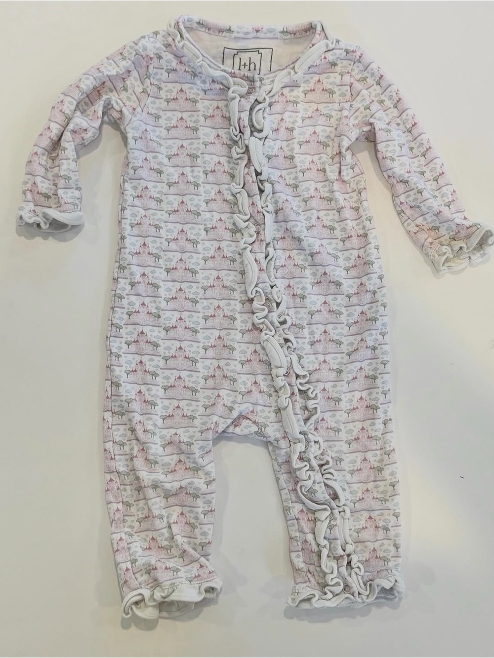 Organic Cotton Ruffle Baby One-Piece in White with Pink Print